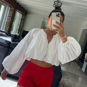 White puffy crop top with long sleeves